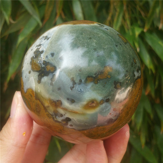 Crystal carved ball of Ocean Jasper
