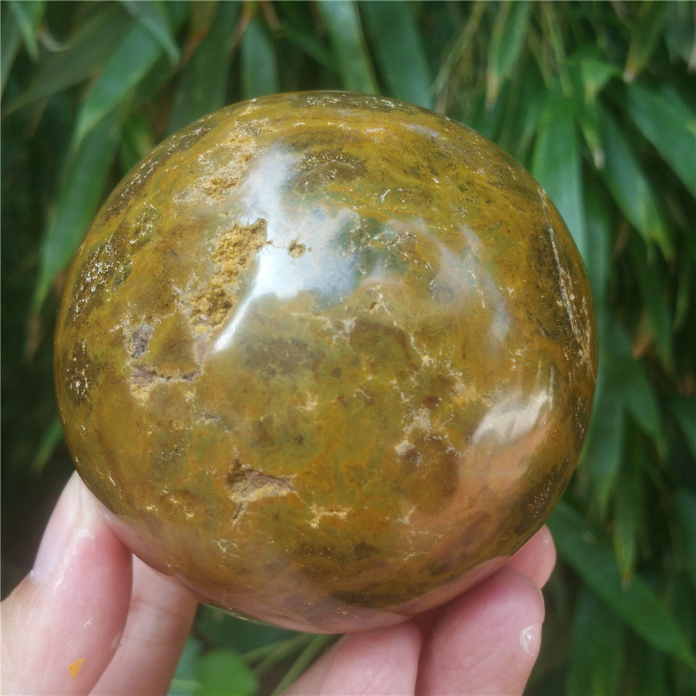 Crystal carved ball of Ocean Jasper