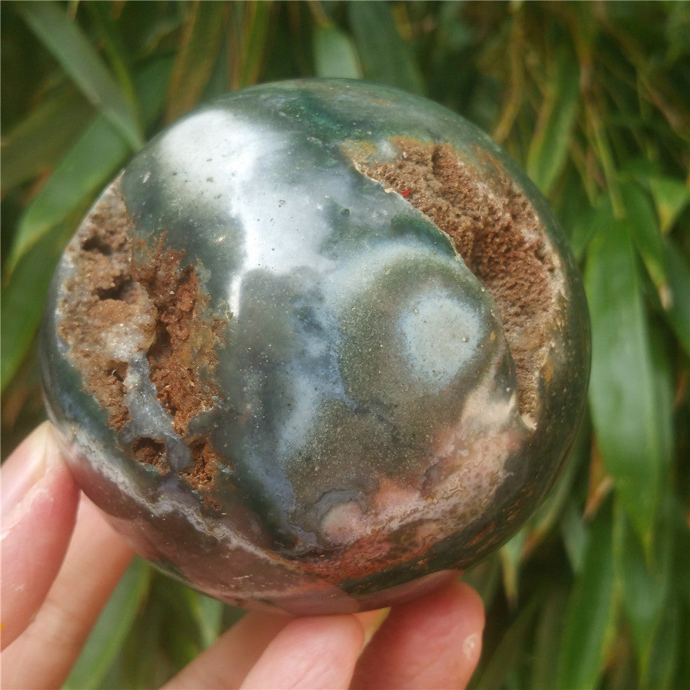 Crystal carved ball of Ocean Jasper