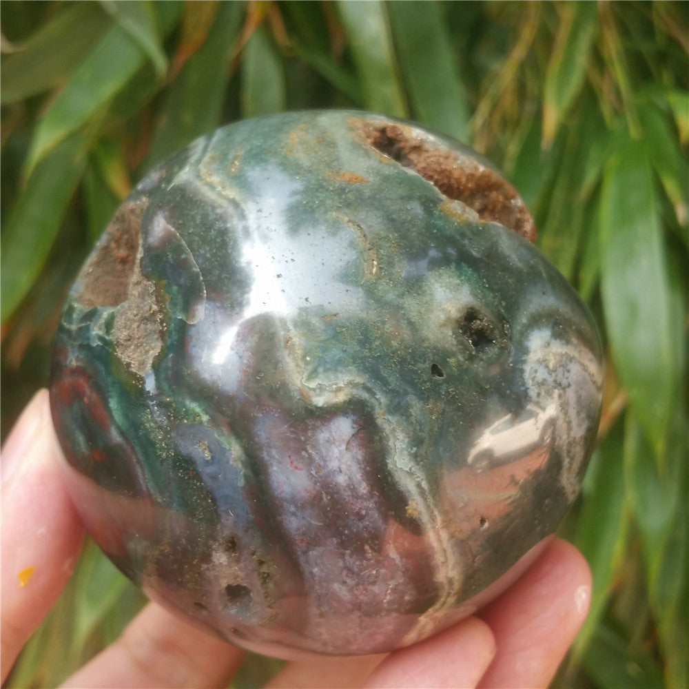 Crystal carved ball of Ocean Jasper