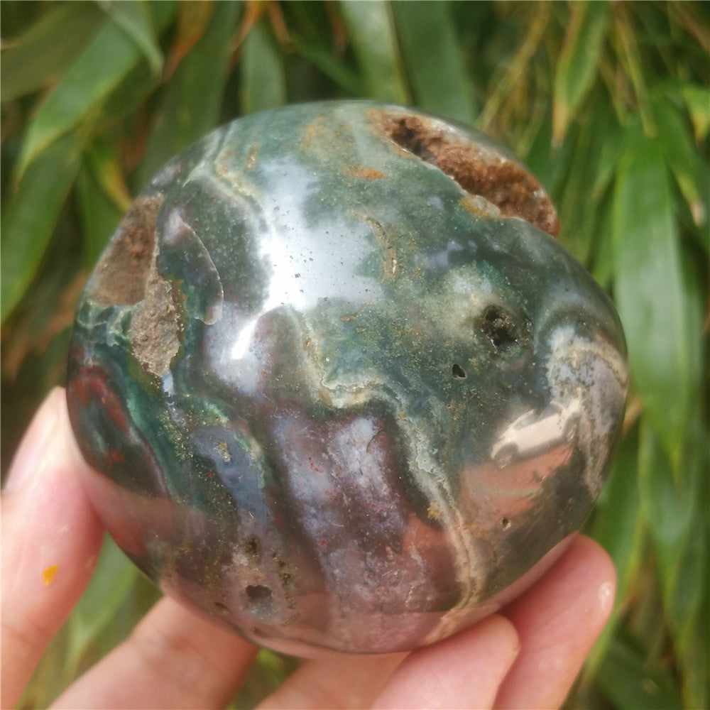 Crystal carved ball of Ocean Jasper