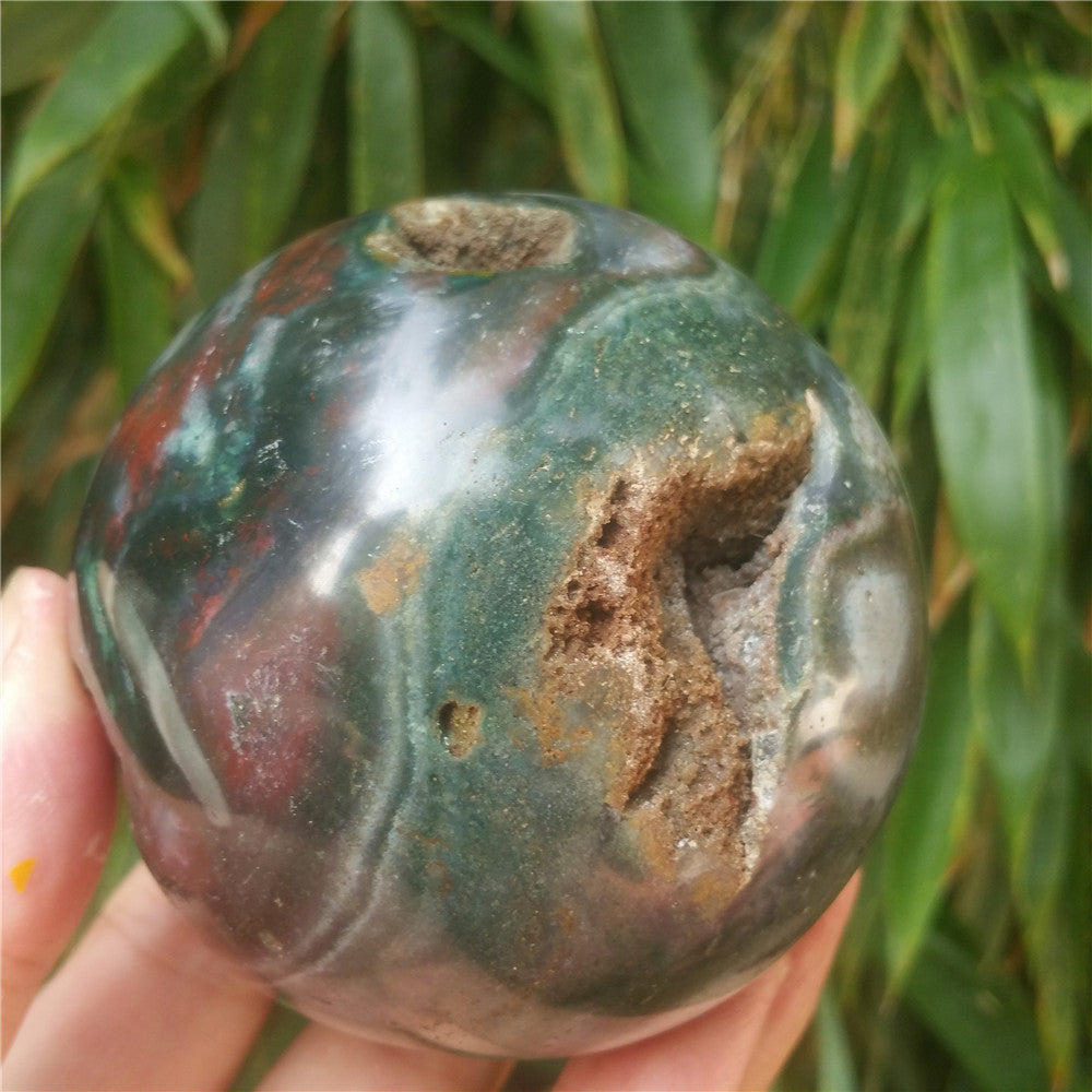 Crystal carved ball of Ocean Jasper