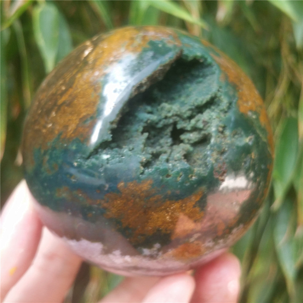 Crystal carved ball of Ocean Jasper