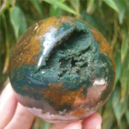 Crystal carved ball of Ocean Jasper