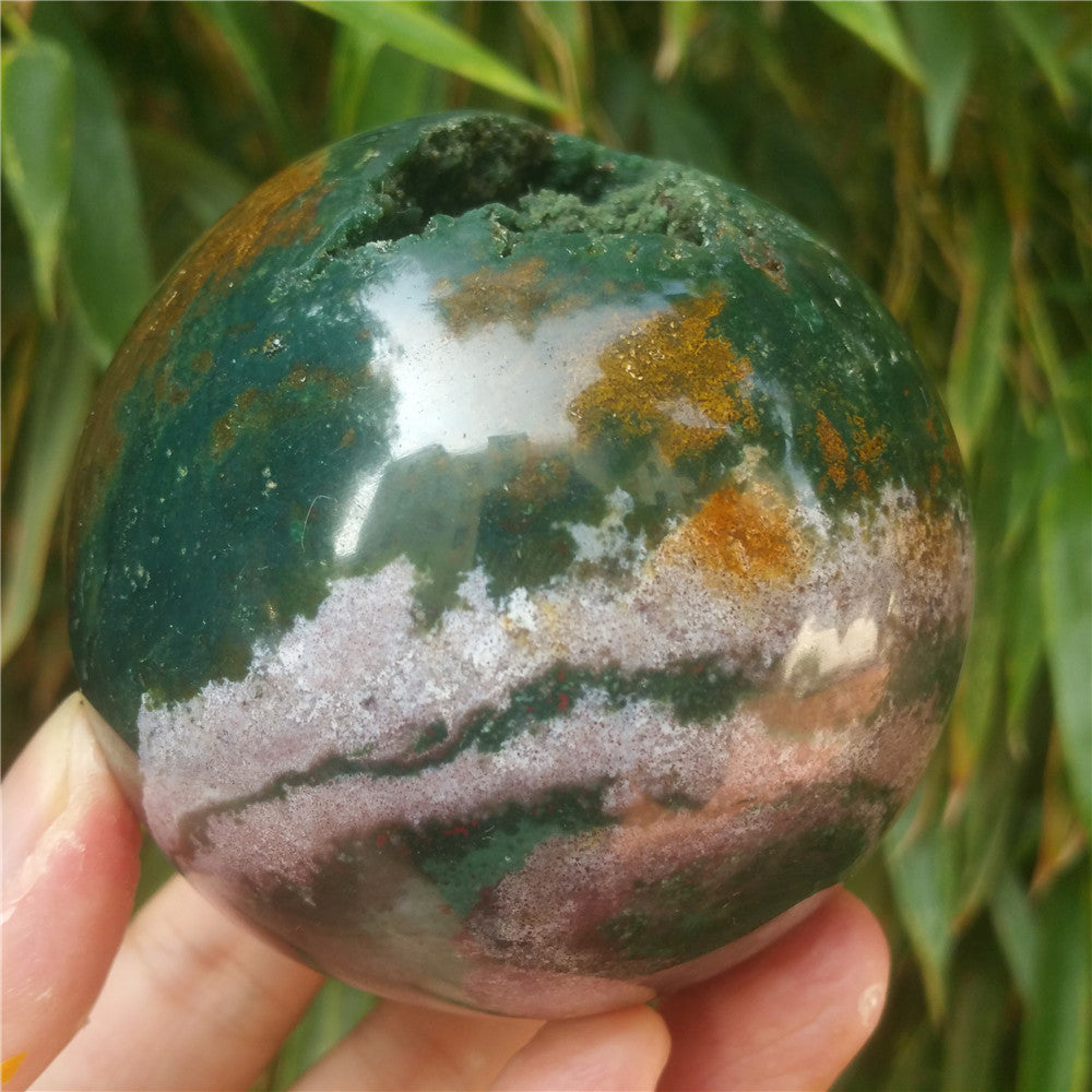 Crystal carved ball of Ocean Jasper