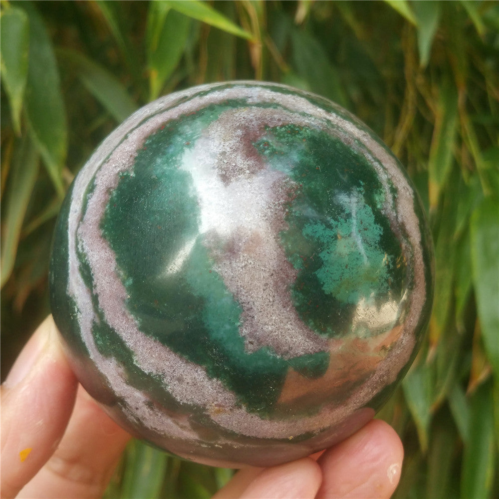 Crystal carved ball of Ocean Jasper