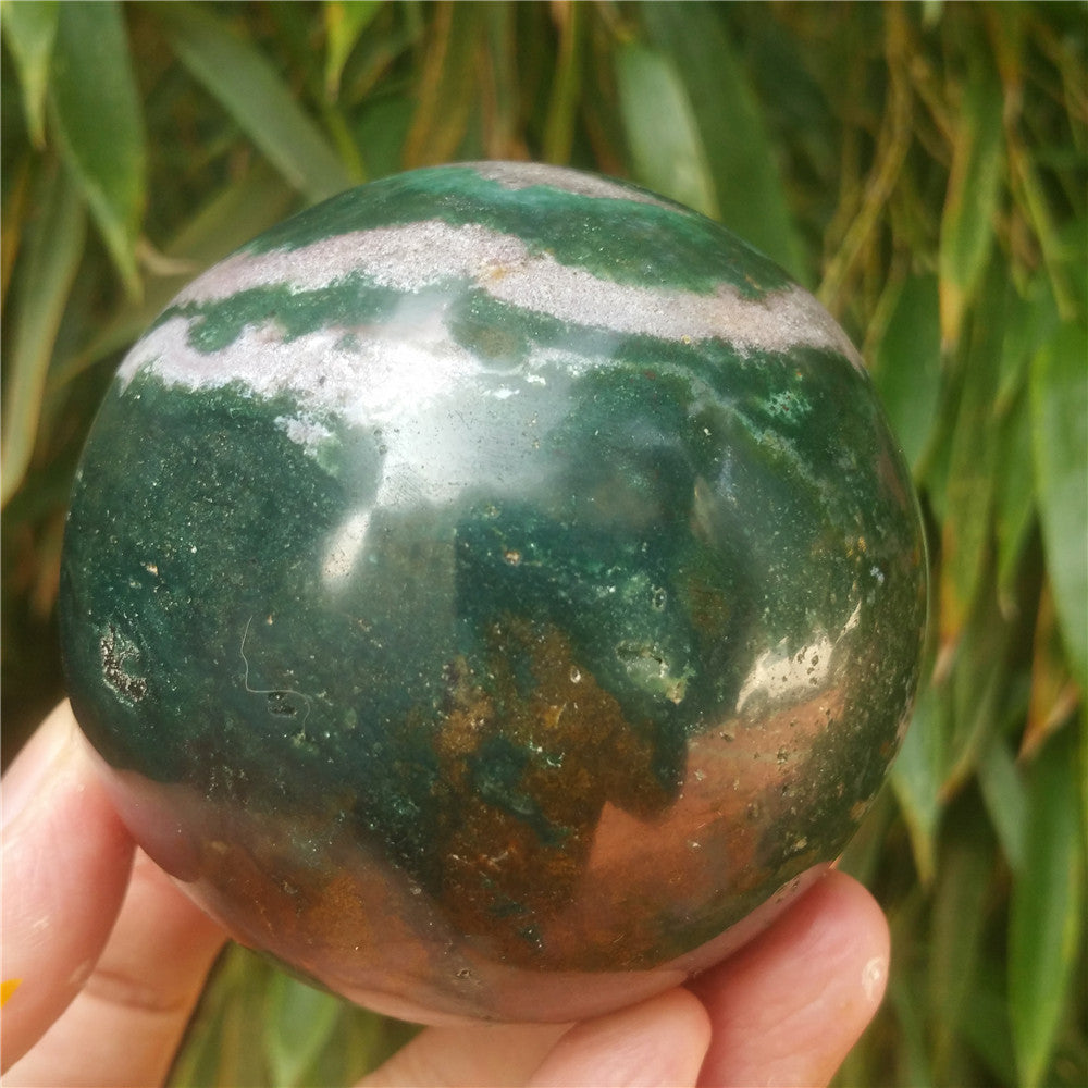 Crystal carved ball of Ocean Jasper