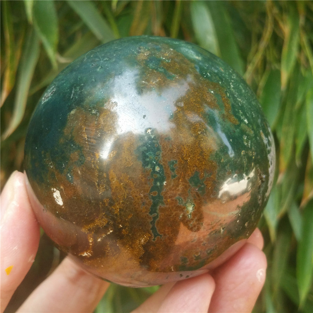 Crystal carved ball of Ocean Jasper