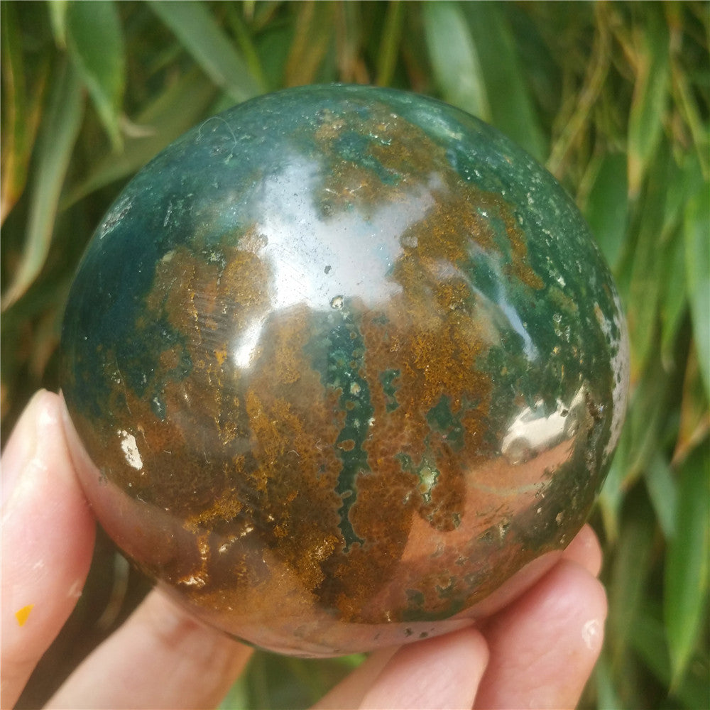 Crystal carved ball of Ocean Jasper