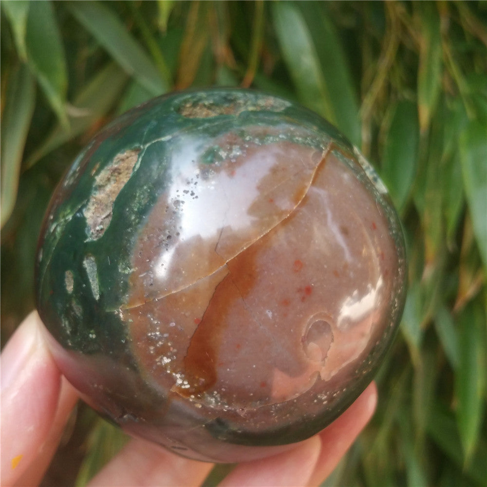 Crystal carved ball of Ocean Jasper