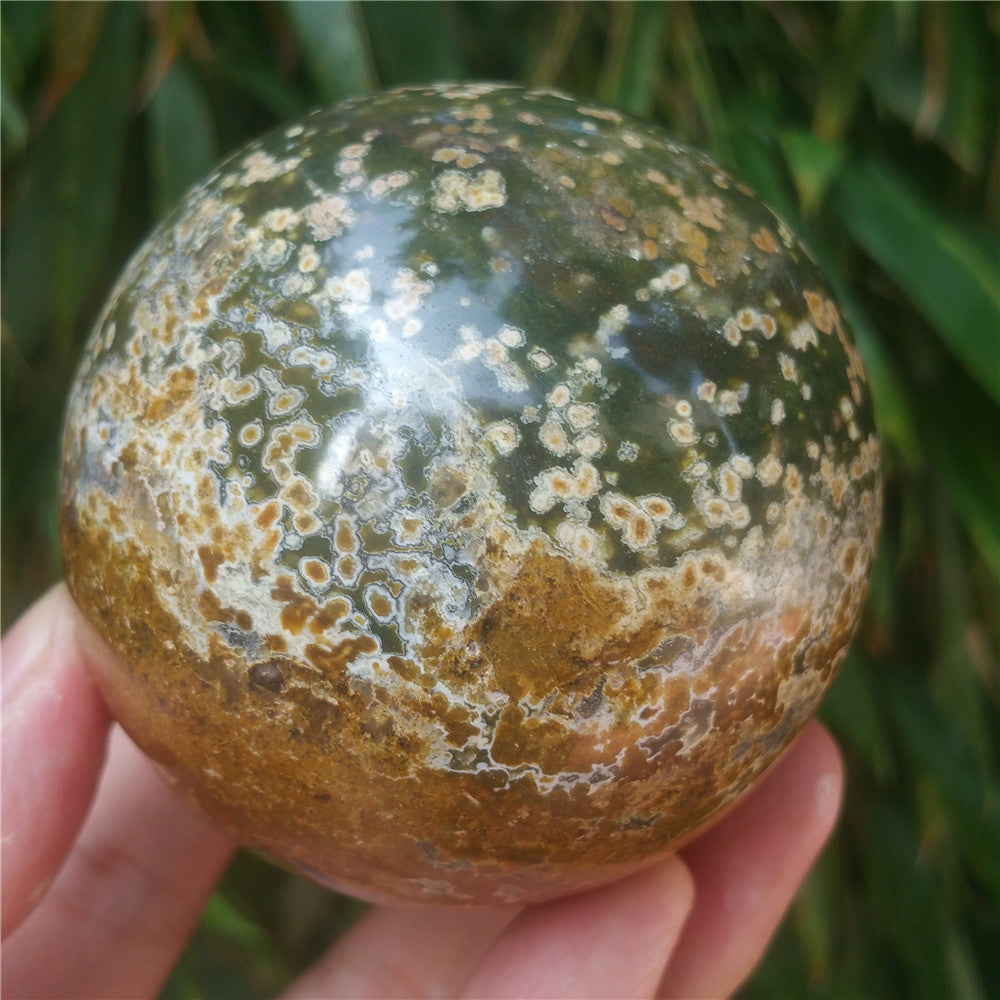Crystal carved ball of Ocean Jasper