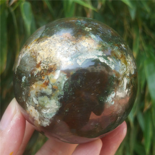 Crystal carved ball of Ocean Jasper