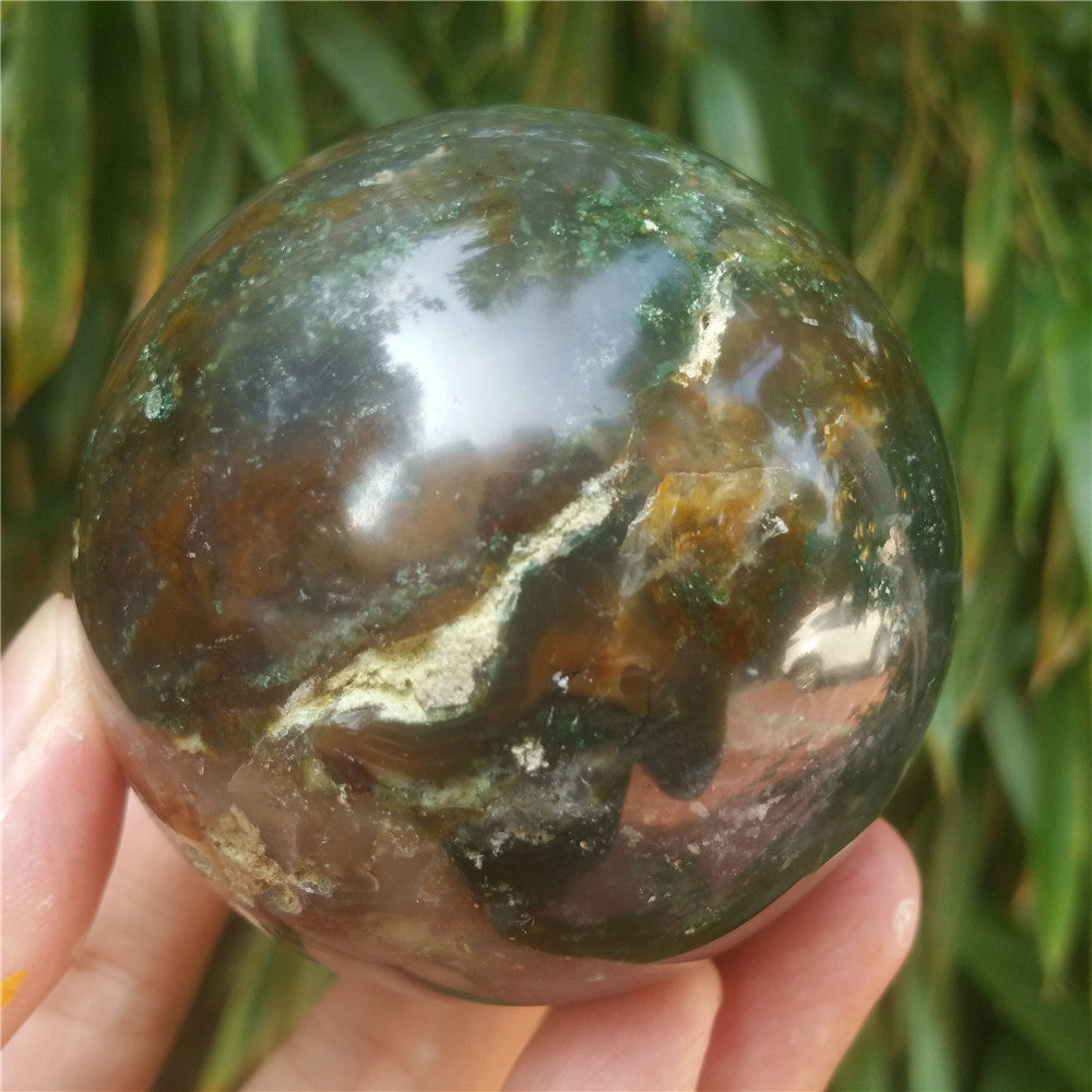 Crystal carved ball of Ocean Jasper