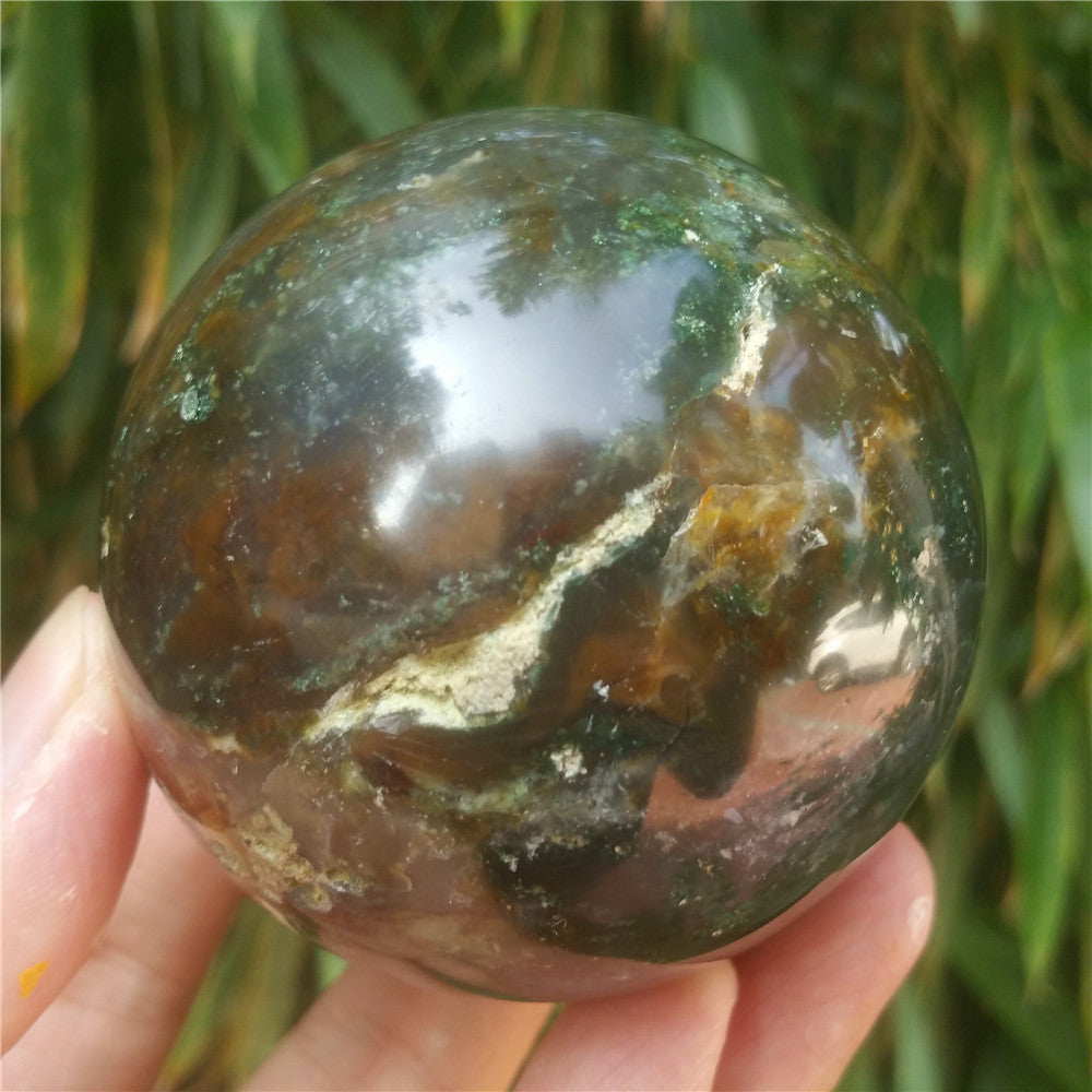 Crystal carved ball of Ocean Jasper