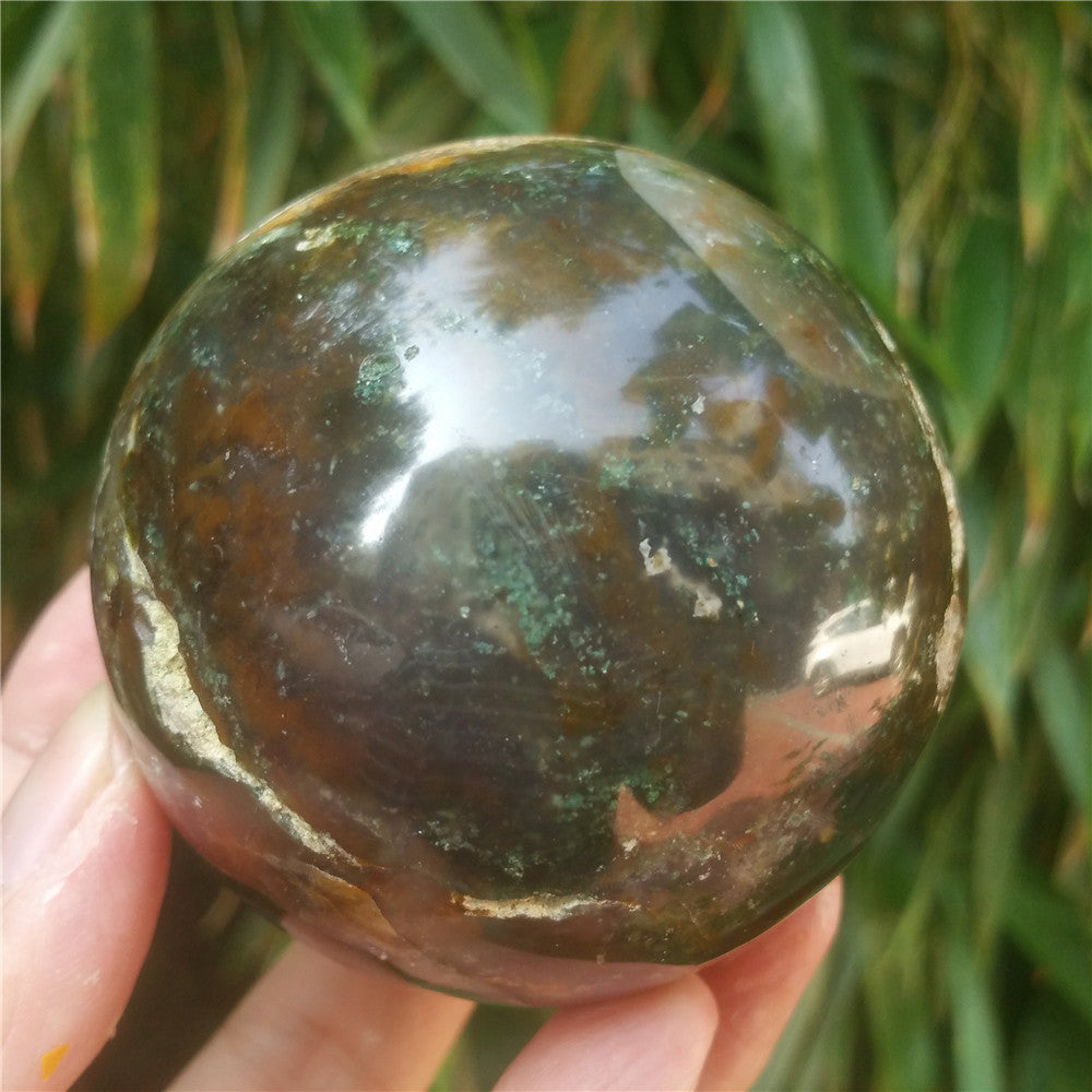 Crystal carved ball of Ocean Jasper