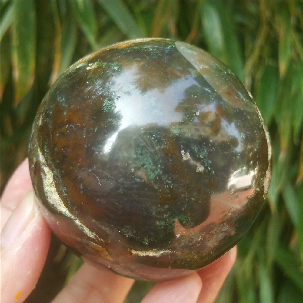 Crystal carved ball of Ocean Jasper