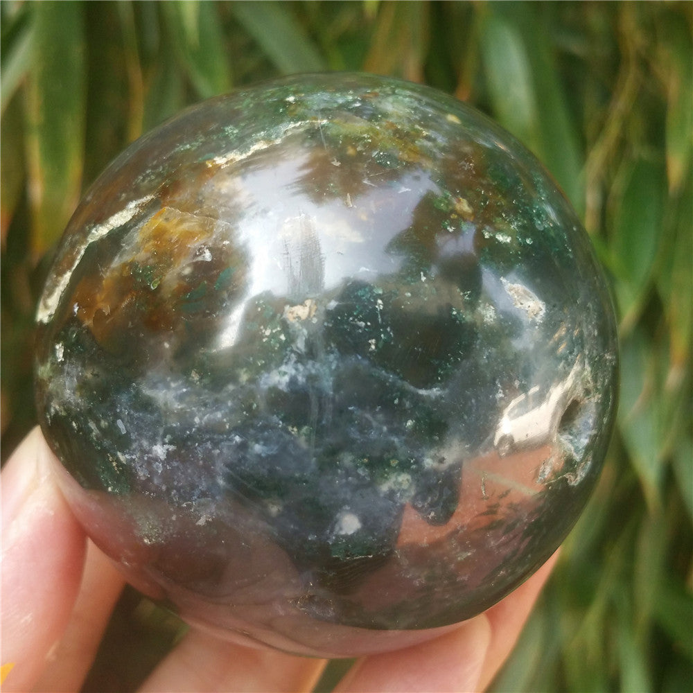 Crystal carved ball of Ocean Jasper