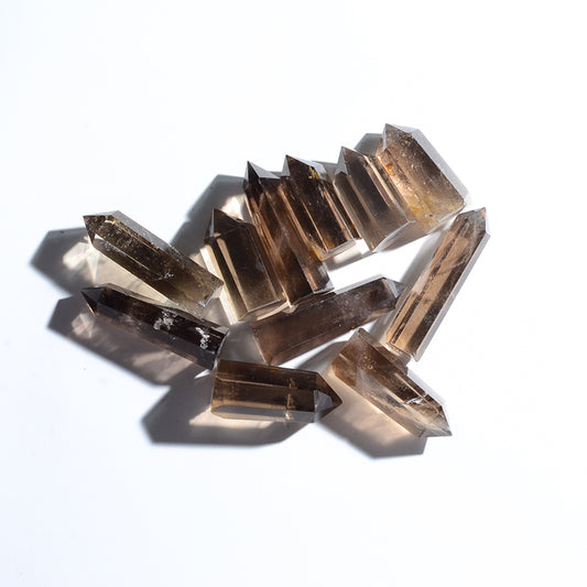 Natural Fangjing Tea Color Crystal Rod Point Quartz