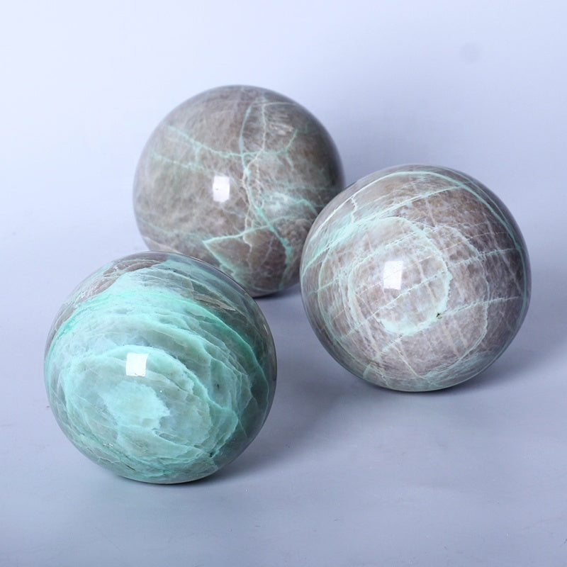 Esfera pulida bola cristalina curativa natural del claro de luna verde para la decoración