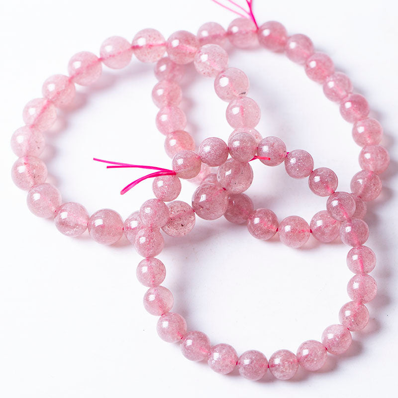 Exquisita pulsera de cuentas de fresa elástica con joyería de cuarzo de cristal