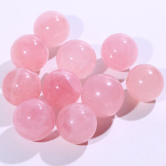 Bola de cristal con forma de piedra rosa 1kg