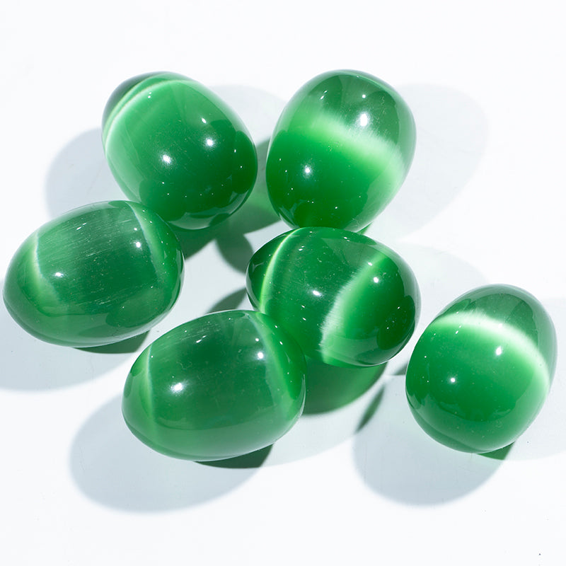 Venta al por mayor de piedras preciosas naturales huevo verde ojo de gato Yoni huevos cristalinos huevos vaginales para curar