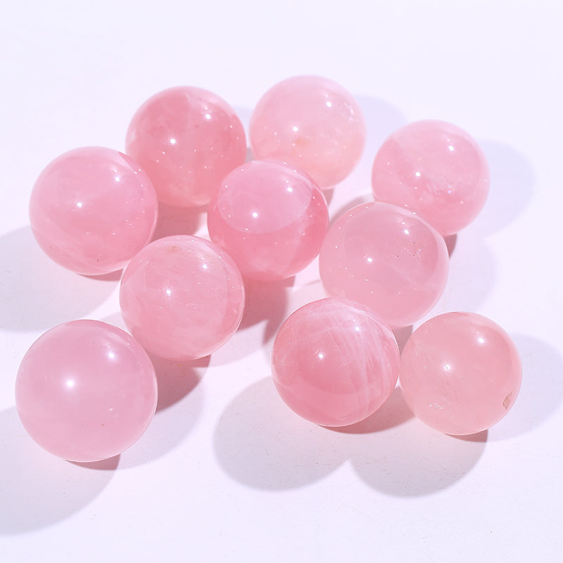 Bola de cristal con forma de piedra rosa 1kg