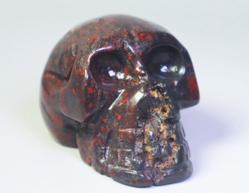 Natural Red Flower Fort Quartz Crystal Palm Stone Carved Skull Healing - China