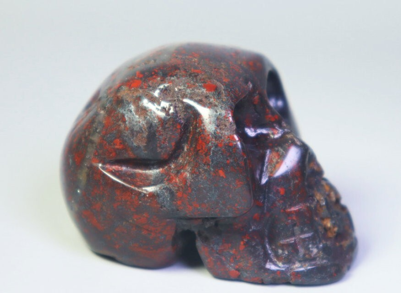 Natural Red Flower Fort Quartz Crystal Palm Stone Carved Skull Healing - China