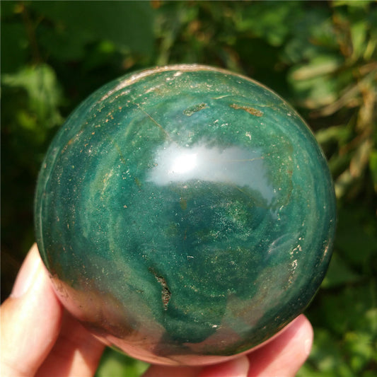 Crystal carved ball of Ocean Jasper