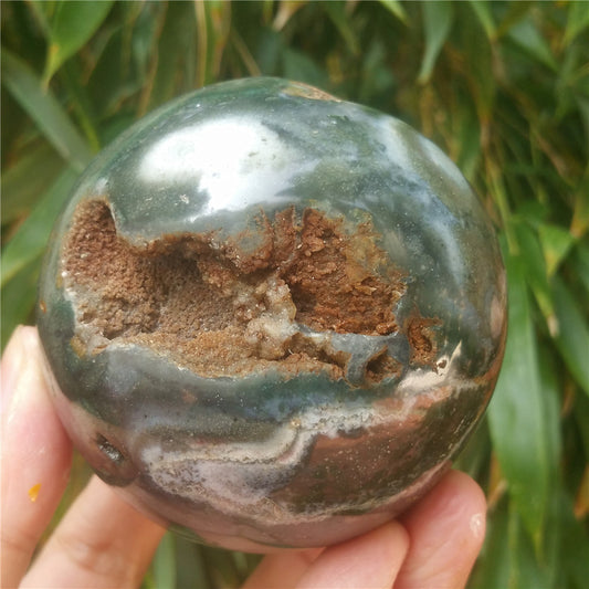 Crystal carved ball of Ocean Jasper