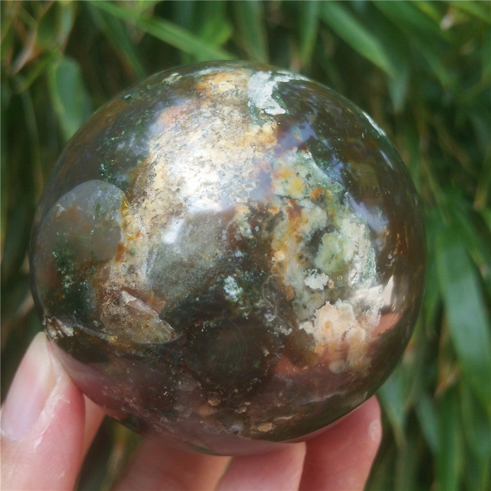 Crystal carved ball of Ocean Jasper