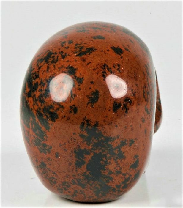 Beautiful rosewood Obsidian carved Skull