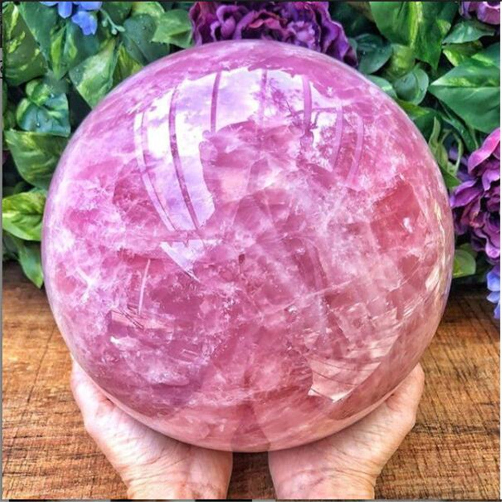 bola de cristal de cuarzo rosa