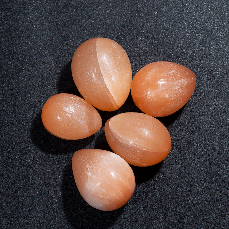Polished natural orange selenite gypsum stone eggs for healing