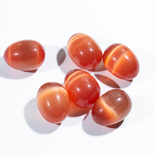 Venta al por mayor de huevo de cristal de piedra de ojo de gato naranja para masaje 