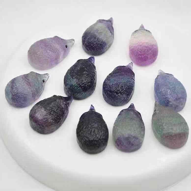 Natural carved rainbow fluorite crystal hedgehog