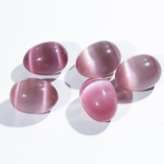 Venta al por mayor huevos cristalinos del yoni del huevo del ojo de gato rosado huevos del cristal de cuarzo 