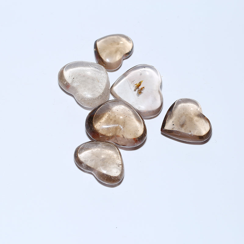 Corazón de cuarzo ahumado en forma de corazón de cristal. 