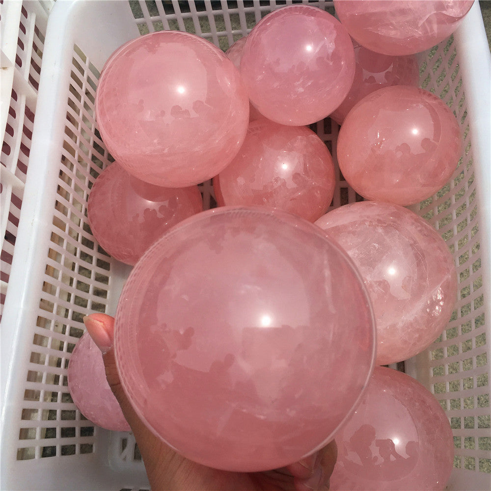 bola de cristal de cuarzo rosa