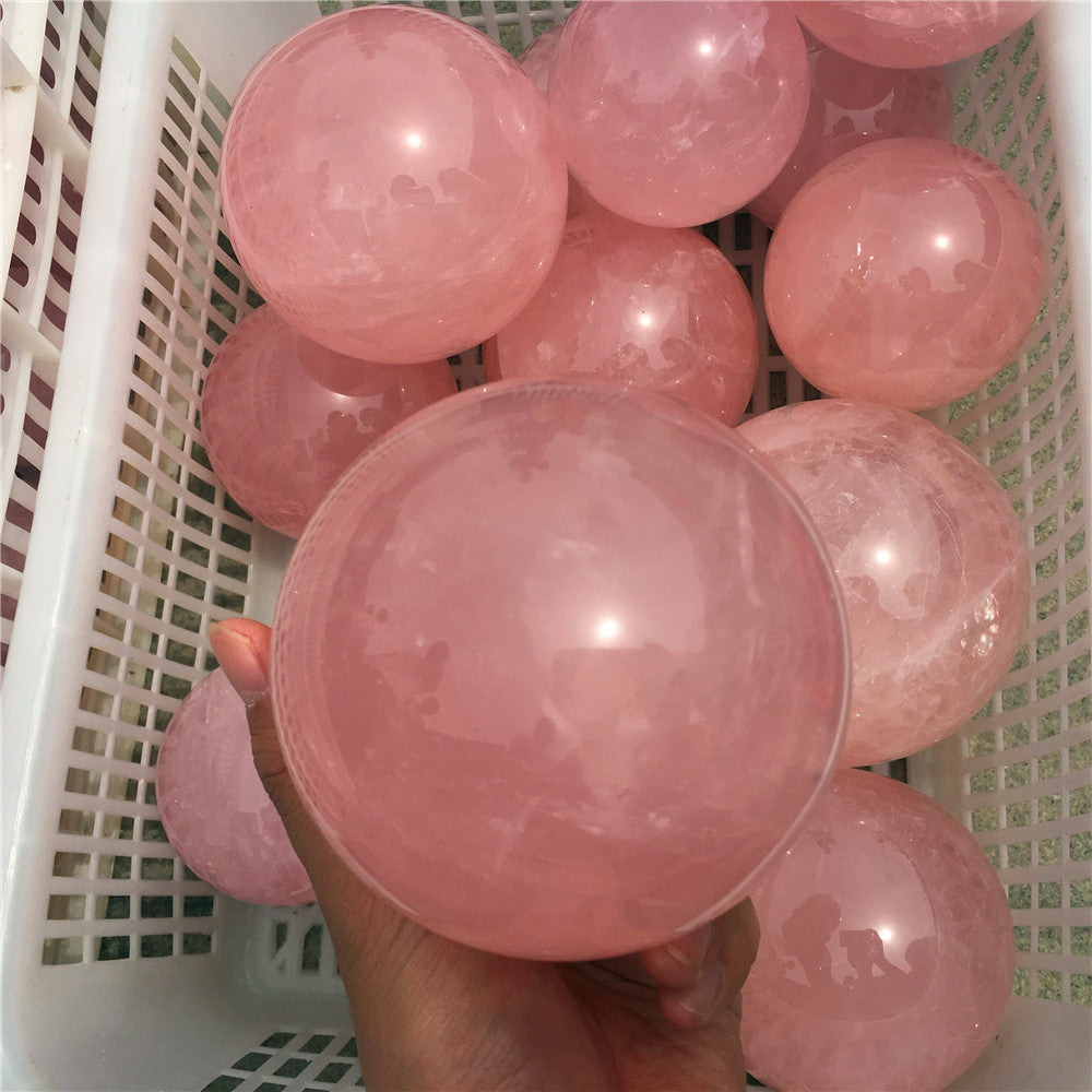 bola de cristal de cuarzo rosa