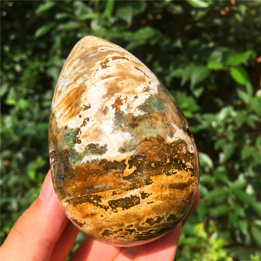 390G  Crystal carved egg of Ocean Jasper  F16