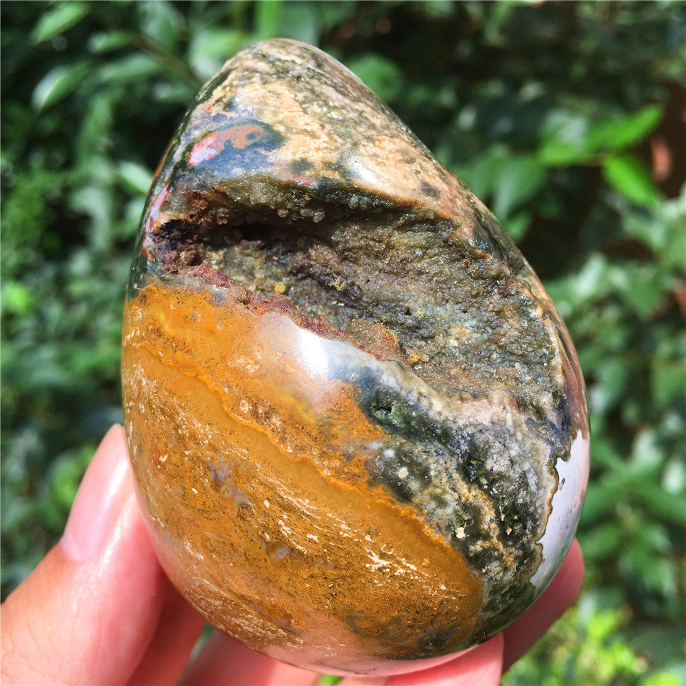323G  Crystal carved egg of Ocean Jasper  F4